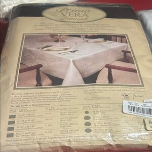 2 excellent quality 70”x144” oblong
Black Damask, white  60”x84” new in pkg.